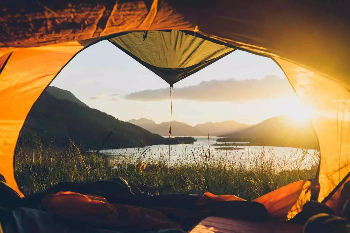 Landscape view of lake from inside tent 