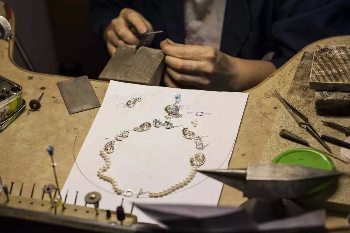 Crafting a necklace in a jewelry shop. Handmade Items