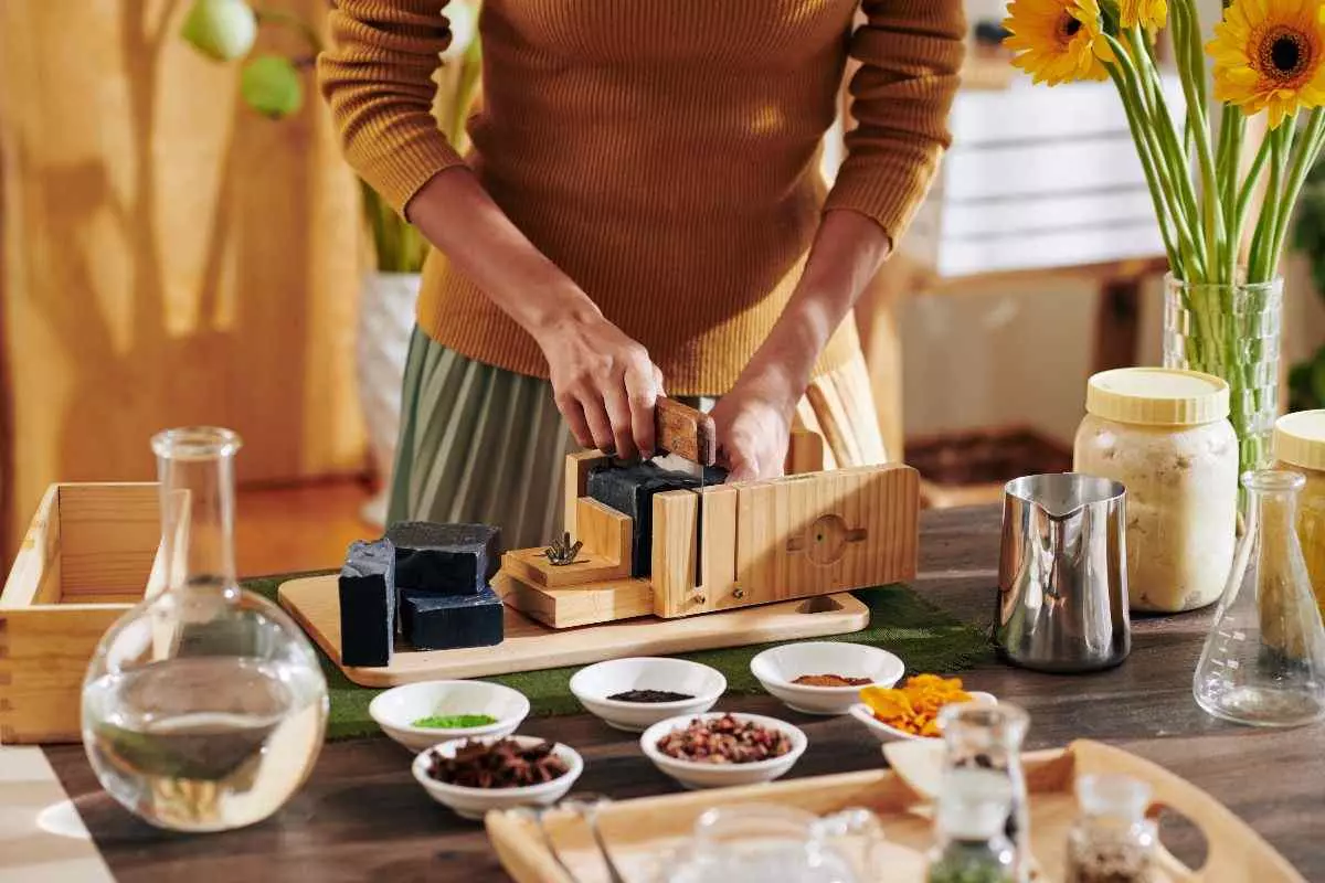 Individual making soap.