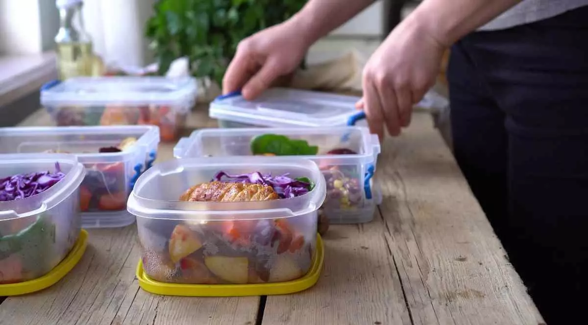 Close up on pre-made meals in containers. 