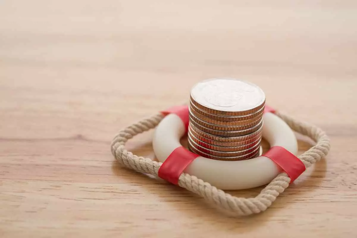 coins surrounded by a life preserve