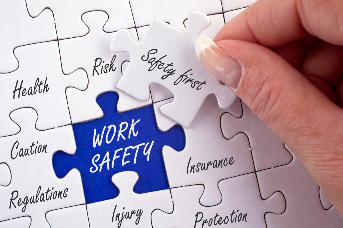 an illustration of a puzzle with the words "workplace safety" in the center