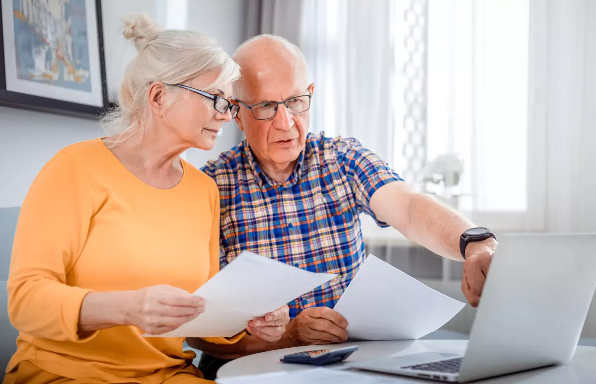 A couple creating a retirement plan together. 