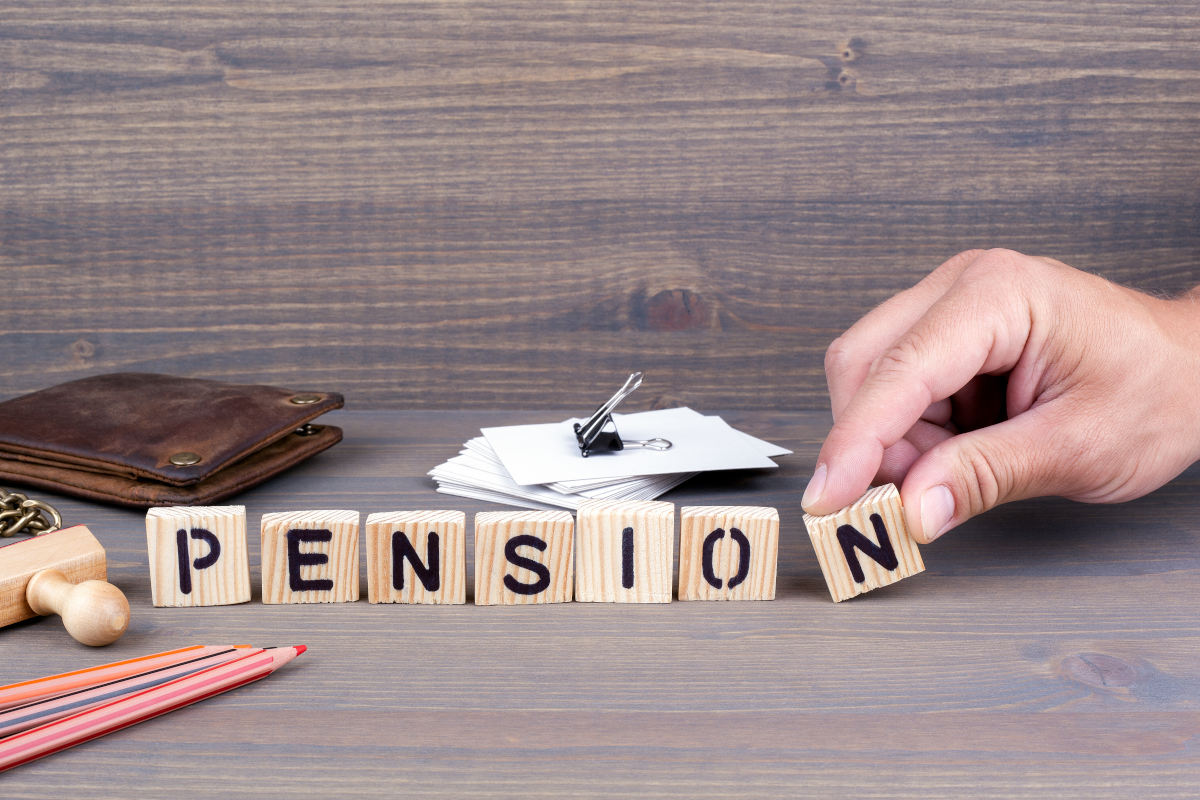 The word "pension" spelled out in wooden blocks. 