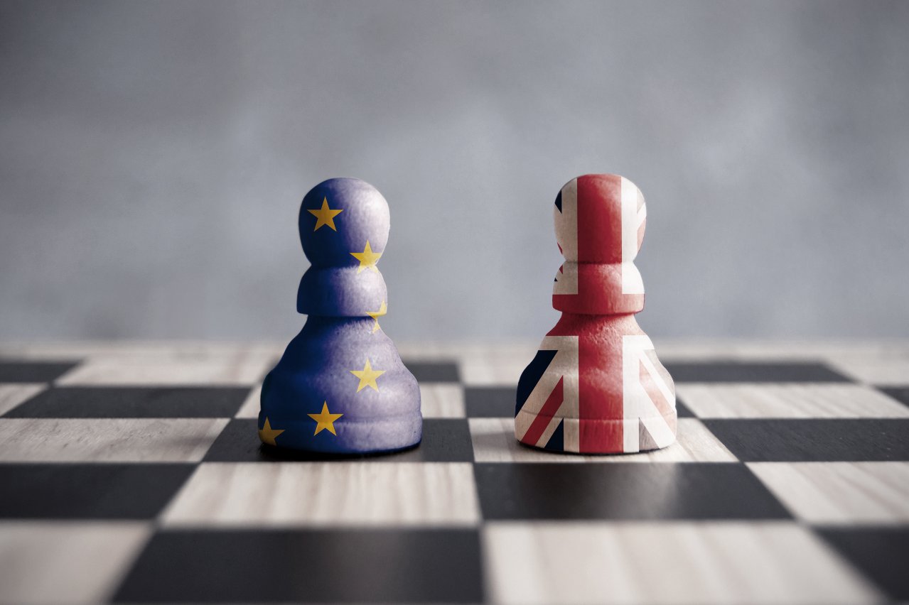 Chess pieces painted as the UK and EU flags